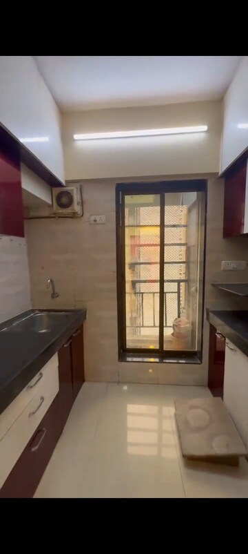 Kitchen in 2 BHK Apartment at RR Hill Galaxy, Mira Road – for Sale