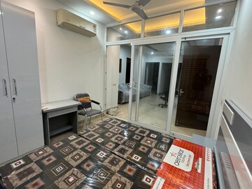 Bedroom in 4 BHK Builder Floor at Ansal Sushant Shopping Arcade, Sector 27 – for Rent