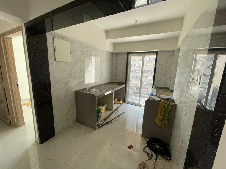 Team Area, sri-zynergy 2 Bedroom 611 Sq.Ft. Apartment In Suman Nagar Mumbai 9485357