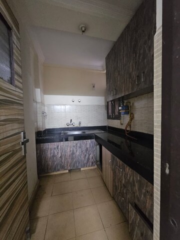 Kitchen in 1 BHK Apartment at DDA Rosewood Apartments, Vasant Kunj – for Rent