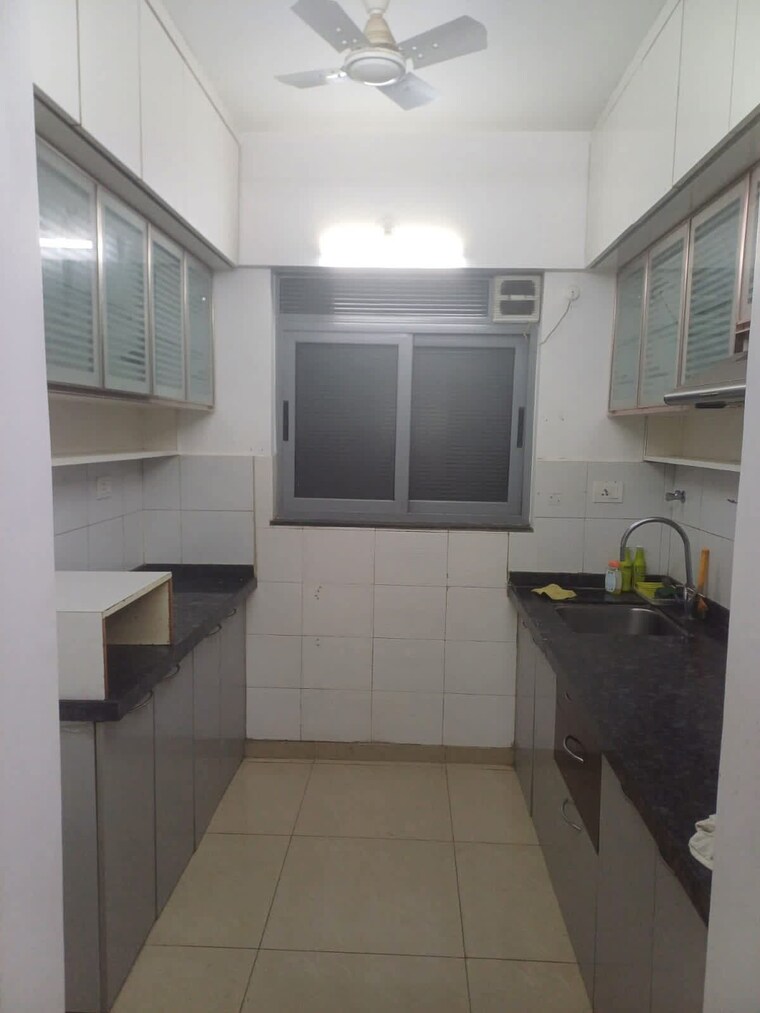 Kitchen, amanora-future-towers 1.5 Bedroom 850 Sq.Ft. Apartment In Hadapsar Pune 9485798