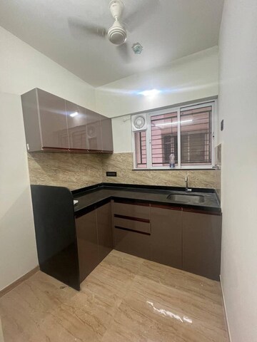 Kitchen in 1 BHK Apartment at Aple Ghar Society – for Sale