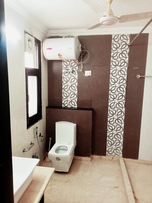 Bathroom in 3 BHK Builder Floor at Defence Colony – for Rent
