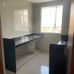 Kitchen in 2 BHK Apartment at Srishti Elegance, Sonapur – for Sale