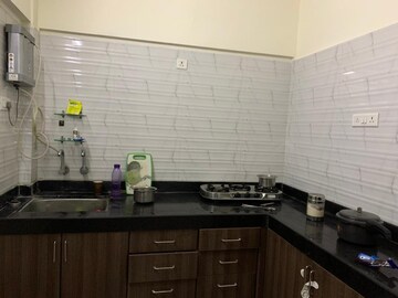Kitchen in 1 BHK Apartment at GK Dwarka Sai, Rahatani – for Sale
