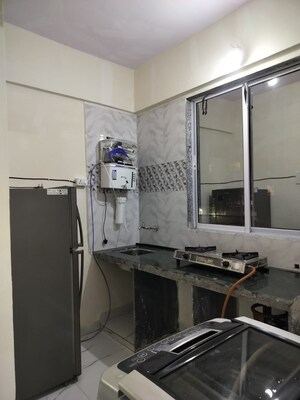 Kitchen in 1 BHK Apartment at Seawoods Sector 36 – for Rent