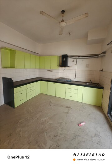 Kitchen in 4 BHK Apartment at Yayati CHS, Seawoods – for Sale