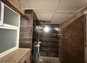 Staircase in 2 BHK Apartment at Raheja Vedaanta, Sector 108 – for Rent