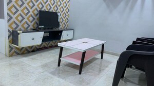 Living Room in 1 BHK Apartment at Lodha Palava Downtown, Dombivli East – for Rent