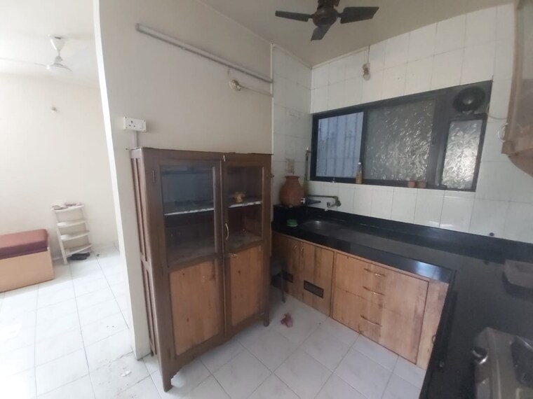 Kitchen, madhavbaug-society 2 Bedroom 845 Sq.Ft. Apartment In Bhusari Colony Pune 9486845