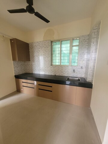 Kitchen in 1 BHK Apartment at Amrut Ganga, Sinhagad – for Sale