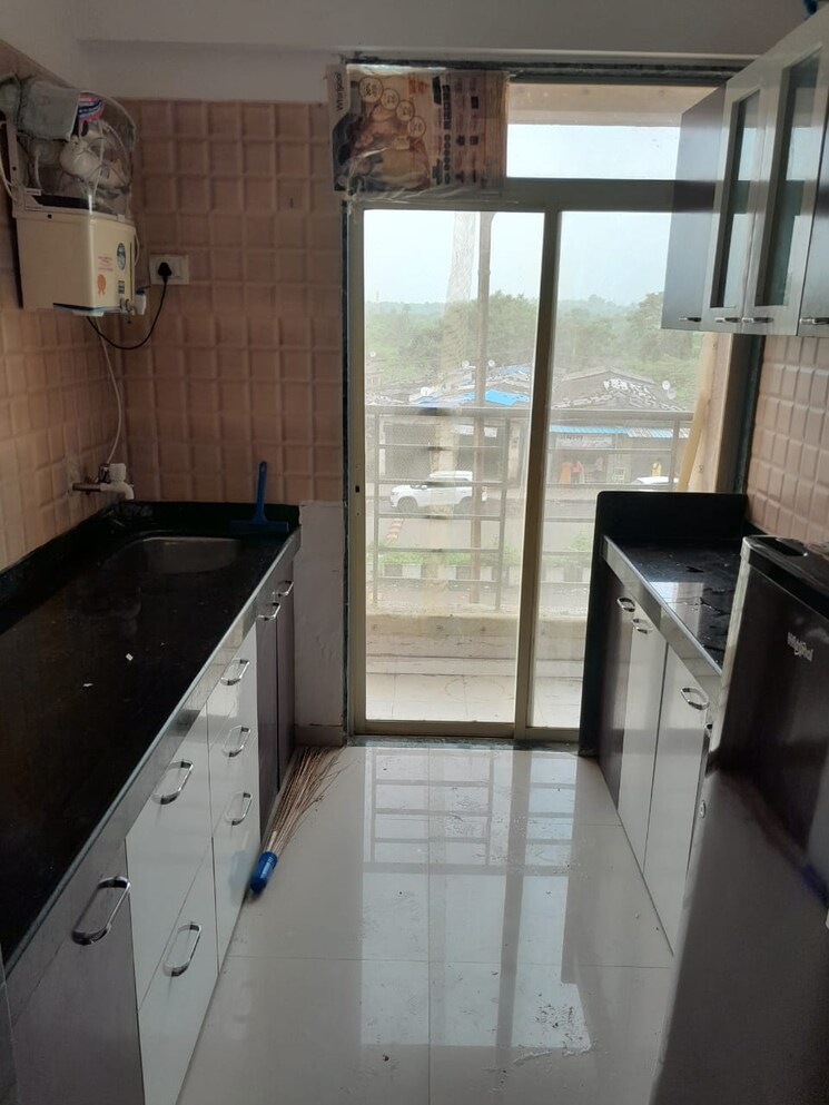 Kitchen, regency-sarvam 2 Bedroom 750 Sq.Ft. Apartment In Titwala Thane 9487469