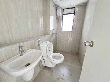 Bathroom in 3 BHK Apartment at Runwal Gardens, Dombivli East – for Rent