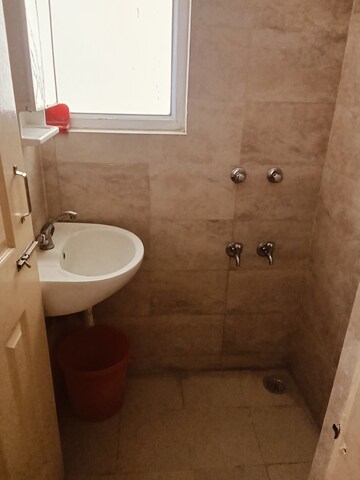 Bathroom in 1 BHK Apartment at Wave Dream Homes, Wave City – for Rent