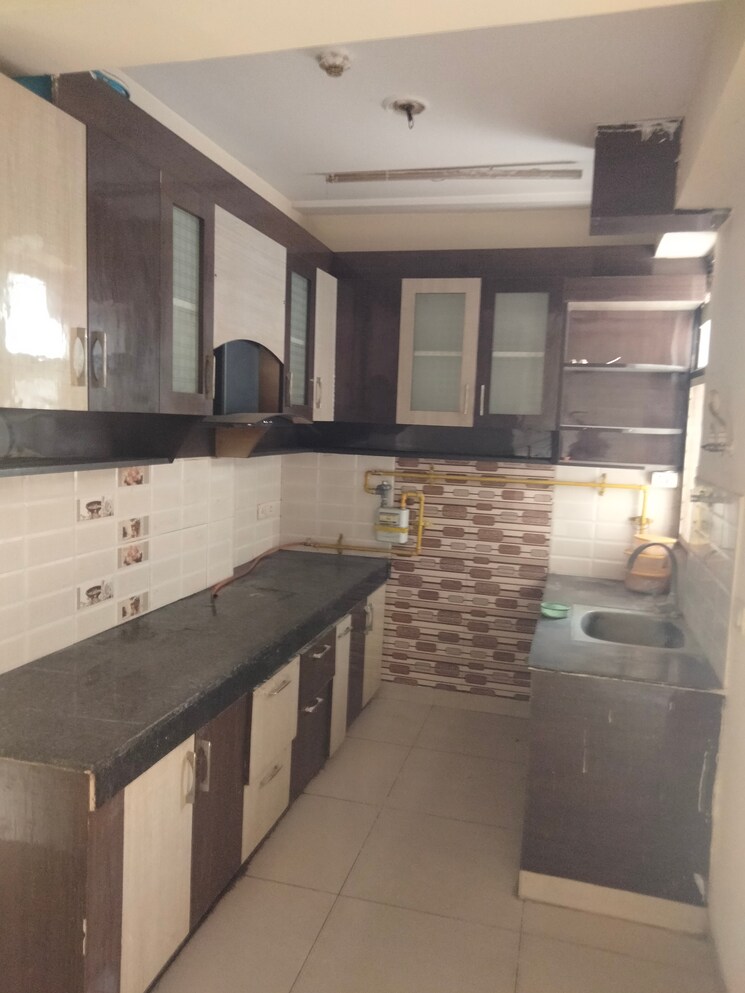 Kitchen, charms-castle 2.5 Bedroom 1115 Sq.Ft. Apartment In Raj Nagar Extension Ghaziabad 9487751
