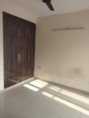 Room in 2.5 BHK Apartment at Charms Castle, Raj Nagar Extension – for Rent
