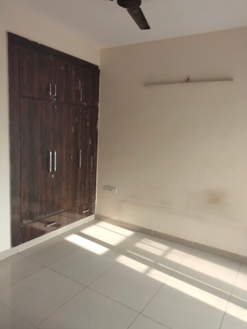 Room in 2.5 BHK Apartment at Charms Castle, Raj Nagar Extension – for Rent