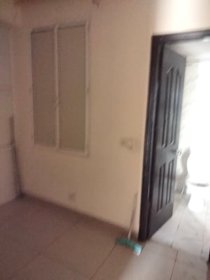 Living Room in 2.5 BHK Apartment at Charms Castle, Raj Nagar Extension – for Rent