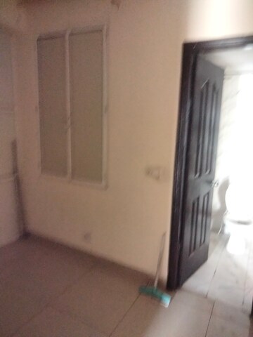 Living Room in 2.5 BHK Apartment at Charms Castle, Raj Nagar Extension – for Rent