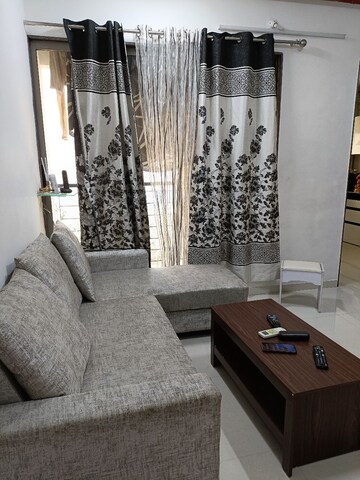 Living Room in 2 BHK Apartment at Runwal Eirene, Balkum Pada – for Rent