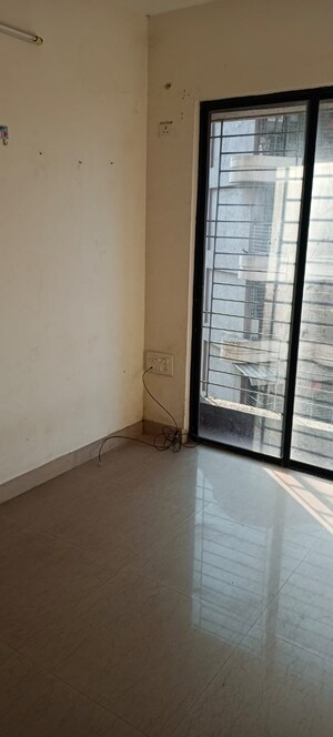 Room in 1 BHK Apartment at Tharwani Vedant Millenia, Titwala – for Sale