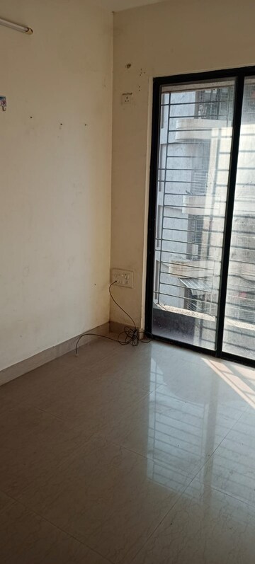 Room in 1 BHK Apartment at Tharwani Vedant Millenia, Titwala – for Sale