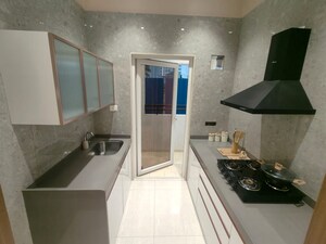 Kitchen in 2 BHK Apartment at Yes Palm Riveria, Mumbra – for Sale