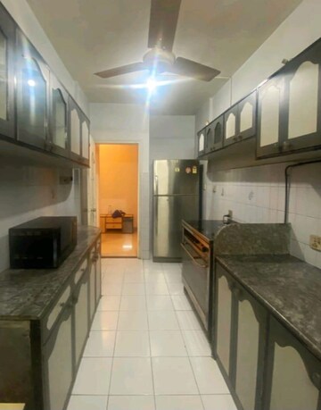 Kitchen in 2.5 BHK Apartment at Adelmar Apartment, Khar West – for Rent