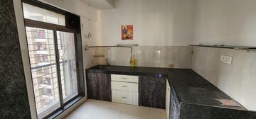 Kitchen in 2 BHK Apartment at Piramal Vaikunth, Balkum Pada – for Rent
