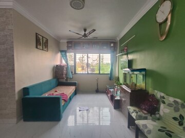 Living Room in 3 BHK Apartment at Mittal Tower CHS, Kopar Khairane – for Sale