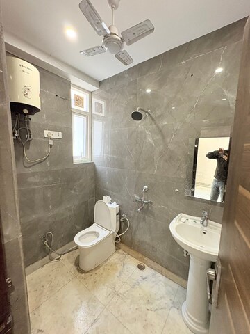 Bathroom in 2 BHK Builder Floor at Chattarpur – for Rent
