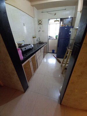 Kitchen in 1 BHK Apartment at Satellite Garden, Goregaon East – for Rent