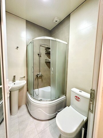 Bathroom in 3 BHK Apartment at Uchdpl Veridia Oakwood Enclave, Wave City – for Sale