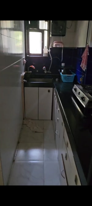 Kitchen in 1.5 BHK Apartment at Andheri West – for Rent