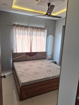 Bedroom in 2 BHK Apartment at Adani Aster Neo, Shantigram – for Rent