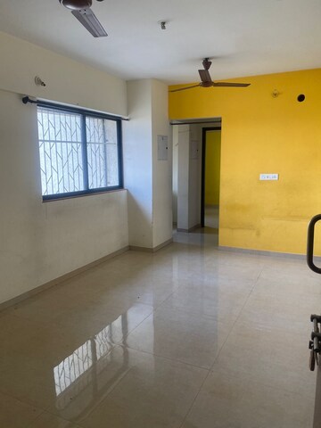 Living Room in 1 BHK Apartment at Lodha Palava Downtown, Dombivli East – for Sale