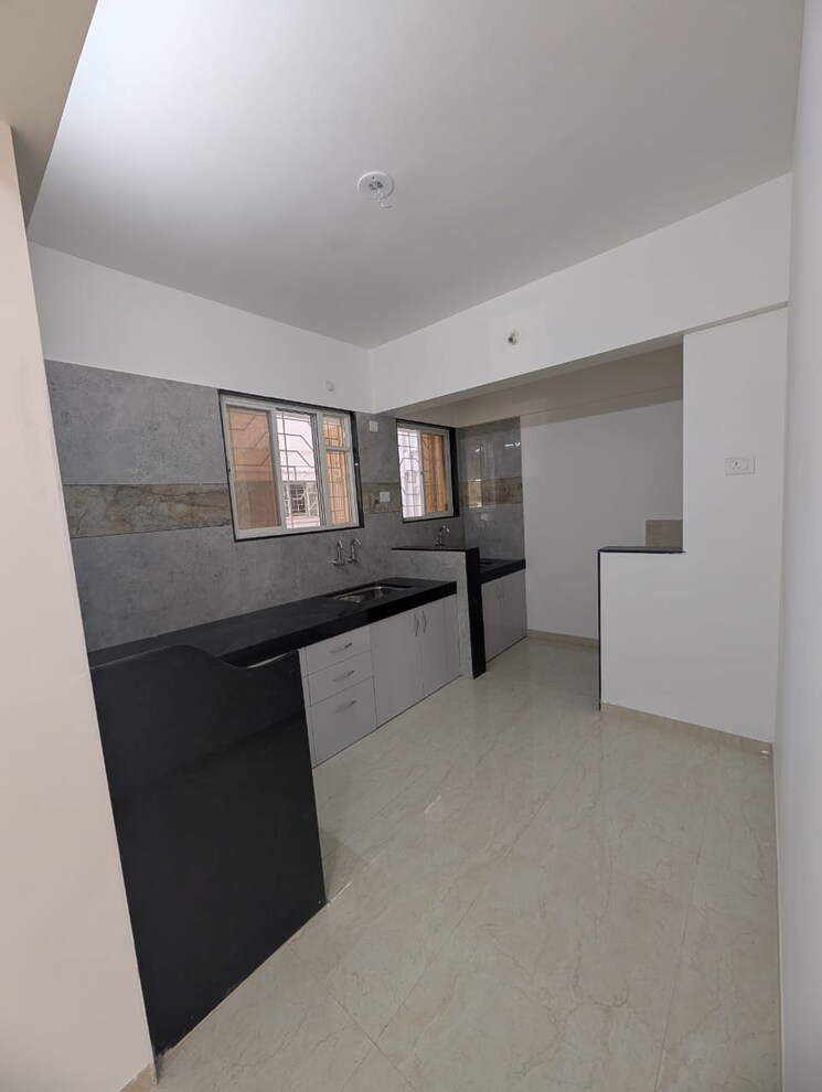 Kitchen, wakad 2 Bedroom 850 Sq.Ft. Apartment In Wakad Pune 9489300