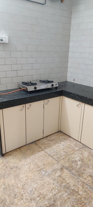 Kitchen in 1 RK Apartment at Satyam CHS Naupada, Naupada – for Rent