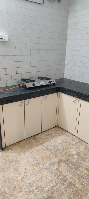 Kitchen in 1 RK Apartment at Satyam CHS Naupada, Naupada – for Rent