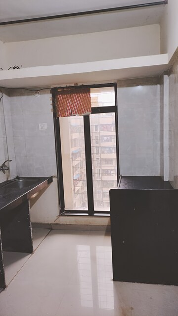 Kitchen in 1 BHK Apartment at Dew Berry, Nalasopara West – for Sale