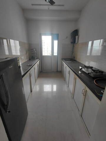 Kitchen in 2 BHK Apartment at Indiabulls Greens, New Panvel – for Rent