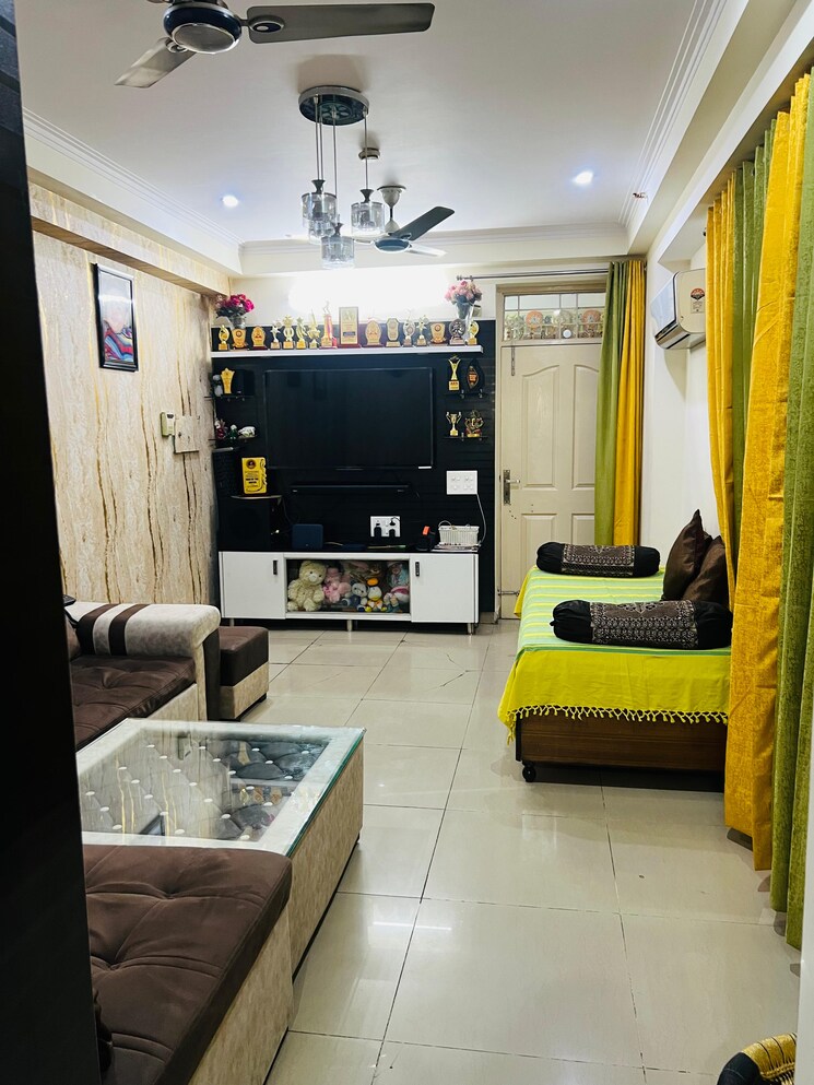 Living Room, gaurs-global-village 2 Bedroom 722 Sq.Ft. Apartment In Sain Vihar Ghaziabad 9489666