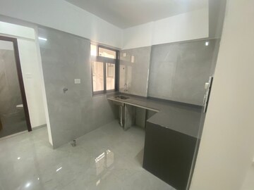 Kitchen in 2 BHK Apartment at Gurunam Royal Diamond CHS, Santacruz East – for Sale