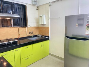 Kitchen in 1 BHK Apartment at Magarpatta City Heliconia, Hadapsar – for Rent