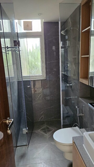 Bathroom in 4 BHK Builder Floor at DLF Building 10, Dlf Phase ii – for Rent