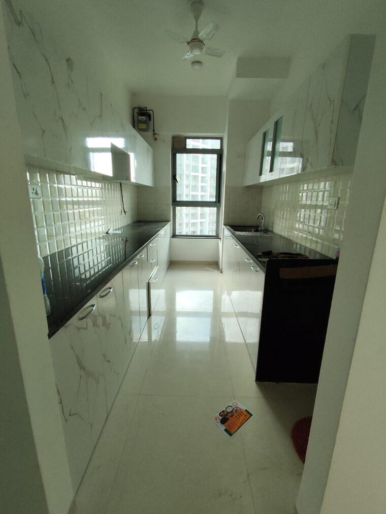 Kitchen, kalpataru-immensa 2 Bedroom 808 Sq.Ft. Apartment In Kolshet Road Thane 9489989