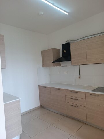 Kitchen in 2 BHK Apartment at Bhartiya Nikoo Homes Phase 2, Thanisandra Main Road – for Rent