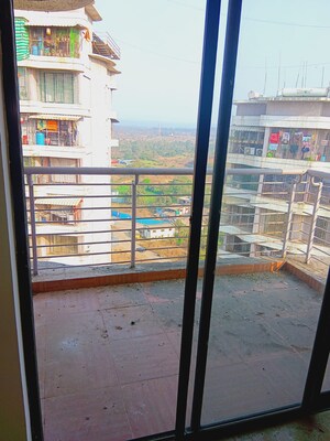 Balcony in 1 BHK Apartment at Tharwani Vedant Millenia, Titwala – for Sale