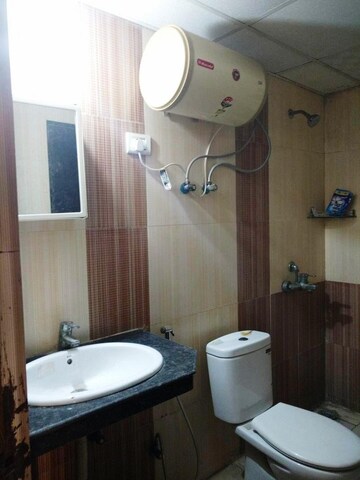 Bathroom in 2 BHK Apartment at Nimbus The Hyde park, Sector 78 – for Rent