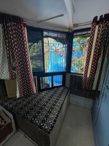Bedroom in 2 BHK Apartment at Madhav Kunj Apartment, Vile Parle West – for Rent